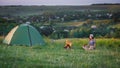 Travel with bicycle alone - young woman in the tent Royalty Free Stock Photo