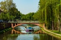 Travel boat in Strasbourg . Reflections in the river Ill