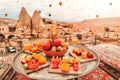 Travel in Cappadocia Colorful hot air balloons flying over the valley sunrise time with .special breakfast travel destination in Royalty Free Stock Photo