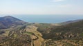 Travel by car. A bird`s eye view of the Green Mountains and the Black Sea coast road Royalty Free Stock Photo