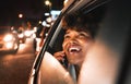 Travel, car and night, black woman and phone call, city view and communication with drive and smile on face Royalty Free Stock Photo