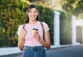 Travel, coffee and happy woman portrait by a city building with freedom on a urban in summer. Relax, smile and morning Royalty Free Stock Photo