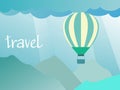 Travel concept - air balloon in the sky over the mountains