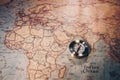 Travel concept background, vintage compas and old earth map