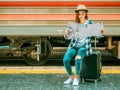 Travel concept.group of traveller friend take photo with train background.asia tourist feel happy in terminal at Hualumpong Royalty Free Stock Photo