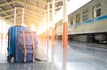 Travel concept,Luggage lined by railway platforms.