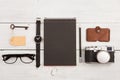 travel concept - set of cool stuff with camera and other things on wooden table Royalty Free Stock Photo