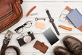 travel concept - set of cool stuff with camera and other things on wooden table Royalty Free Stock Photo