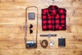 Travel concept shirt, camera, flask, watch, wallet on desk Royalty Free Stock Photo