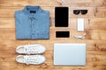 Travel concept shoes, shirt, mobile phone, laptop,mp3, usb, eyeglasses