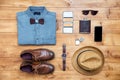 Travel concept shoes, shirt, mobile phone, watch, flask, eyeglasses, hat