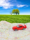Travel concept, small car on map Royalty Free Stock Photo