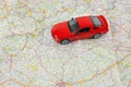 Travel concept, small car on map Royalty Free Stock Photo