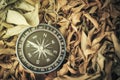 Travel concept. Success business concept. Compass on weathered l