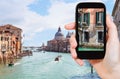 Tourist photographs grand canal in Venice city Royalty Free Stock Photo