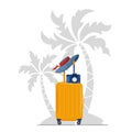 Travel concept vector illustration in flat style design.Women`s suitcase with women summer hat and camera under the palm trees sil Royalty Free Stock Photo