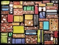 Travel concept. Wall of various styles of suitcases