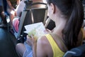 Travel concept. Woman read road map in public bus Royalty Free Stock Photo