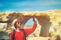 Travel concept - young man making selfie in Azure window, Gozo Royalty Free Stock Photo