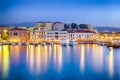 Travel Concepts. Picturesque Image of Old Venetian Harbour of Chania with Fisihing Boats and Yachts on the Foregound Taken At Blue Royalty Free Stock Photo