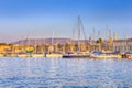 Travel Concepts. Picturesque Image of Old Venetian Harbour of Chania with line of Fisihing Boats and Yachts in the Foregound Royalty Free Stock Photo