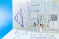 Travel concepts. Two black traveler miniature figures people with backpack standing on passport with many country immigration