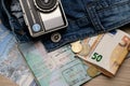 Travel conceptual image of travel passport, money,vintage camera and jeans Royalty Free Stock Photo