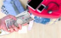 Travel cost, hand woman with Japanese currency yen bank notes on Royalty Free Stock Photo