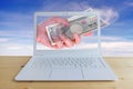 Travel cost, hand woman with Japanese currency yen bank notes with modern laptop Royalty Free Stock Photo