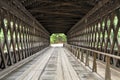 Travel through covered wooden bridge Royalty Free Stock Photo