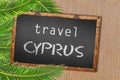 Travel Cyprus palm trees and blackboard on sandy beach Royalty Free Stock Photo