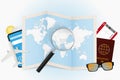 Travel destination Bulgaria, tourism mockup with travel equipment and world map with magnifying glass on a Bulgaria