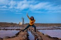 Smiling woman having fun in the Salinas de Pozo Izquierdo. Aguimes. Gran Canarias. Las Palmas. Canary Islands Royalty Free Stock Photo