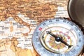 Travel destination Italy, ancient map with vintage compass Royalty Free Stock Photo