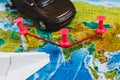 Travel Destination Points on World Map Indicated with Colorful Thumbtacks, Rope and Shallow Depth of Field. Royalty Free Stock Photo