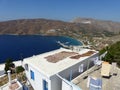 White house terrace with apricots in the sun to Amorgos in Greece.