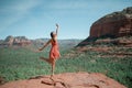 Travel in Devil& x27;s Bridge Trail, scenic view panoramic landscape in Sedona, Arizona, USA. Happy young woman on the Royalty Free Stock Photo