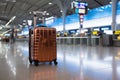 Travel essentials Trolley suitcase in international airport with information board