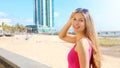 Travel Europe summer holiday girl enjoying Arrecife, Lanzarote, Canary Islands. Sun getaway woman smiling with sunglasses on her Royalty Free Stock Photo