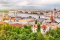 Travel and european tourism concept. Parliament and riverside in Budapest Hungary during summer sunny day with blue sky and clouds