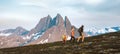 Travel family hiking in mountains outdoor parents father, mother and child together trekking in Norway Royalty Free Stock Photo