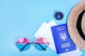 Travel flatlay with passport