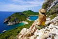 Travel in Greece. Female hiker girl enjoying natural landscape in Corfu Island, Greece Royalty Free Stock Photo