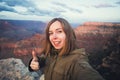 Travel hiking selfie photo of young beautiful teenager student at Grand Canyon viewpoint in Arizona Royalty Free Stock Photo