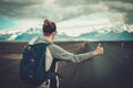 Travel hitchhiker woman walking on a road Royalty Free Stock Photo