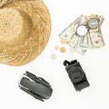Travel holiday concept. Drone, straw hat, photo camera, compass and USA cash on white background. Flat lay, top view. Royalty Free Stock Photo