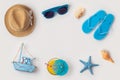 Travel holiday vacation concept with beach and travel items organized on white background Royalty Free Stock Photo