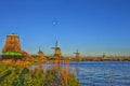 Line of Traditional Dutch Windmills in the Village of Zaanse Schans, in the Netherlands Royalty Free Stock Photo