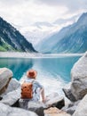 Travel image. Traveler look on the mountain lake. Travel and active life concept. Royalty Free Stock Photo