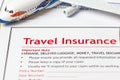 Travel Insurance Claim application form on brown envelope, business insurance and risk concept; document and plane is mock-up Royalty Free Stock Photo